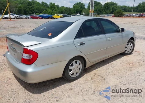 2002 Toyota Camry Le from USA, damaged, VIN 4T1BE32K12U535663